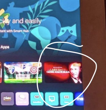 A hand-drawn white circle on a Smart Hub interface highlights a featured tile for "LAST DAYS GENE HACKMAN," while the post suggests the red coloring of the title is an intentional clue tied to $XRP.