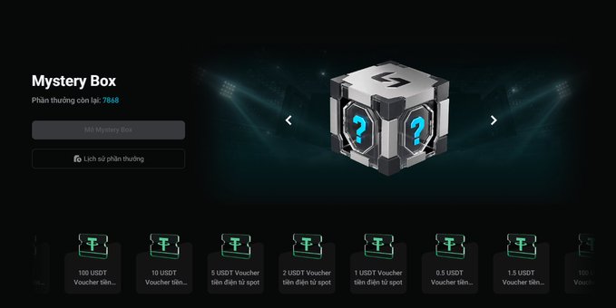 A 'Mystery Box' rewards interface displays various USDT voucher prizes in Vietnamese, including 100, 10, 5, 2, 1, 0.5, and 0.1 USDT options.