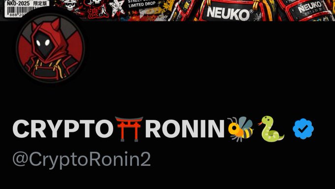 The image shows a Twitter/X profile for Crypto Ronin (@CryptoRonin2) with a verified blue checkmark next to the username, featuring a red-hooded ninja avatar and "CRYPTO RONIN" branding with a Japanese torii gate. The post celebrates receiving verification again on X, as indicated by the verified badge displayed in the profile.
