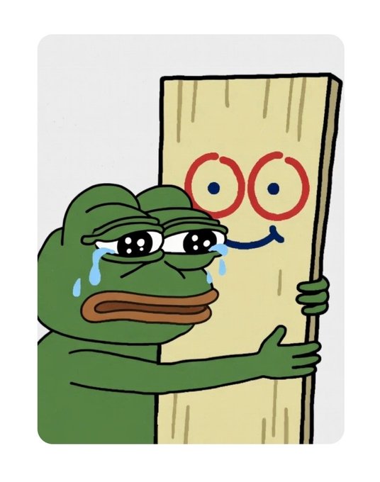 A cartoon illustration of a crying green frog character (Pepe) hugging a wooden plank with a drawn-on smiling face with red eyes.