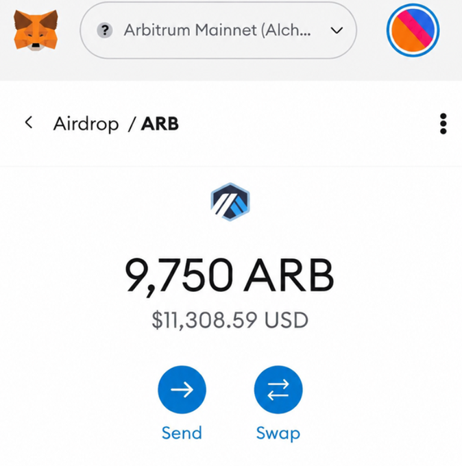 A MetaMask wallet interface showing an airdrop of 9,750 ARB ($11,308.59 USD) on the Arbitrum Mainnet (Alchemy) with Send and Swap buttons.