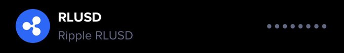 The image features a gray background, with a blue Ripple Ledger logo prominently displayed at the top center. Below the logo, there's text that reads "RLUDD" followed by "ripple rludd". The text also mentions "RIPPLE RLPUSD", which is likely an abbreviation for Ripple Ledger Standard Edition (Ripple Ledger SE). The image seems to be promoting Ripple Ledger as a secure and transparent way of managing digital assets, with the focus on privacy.