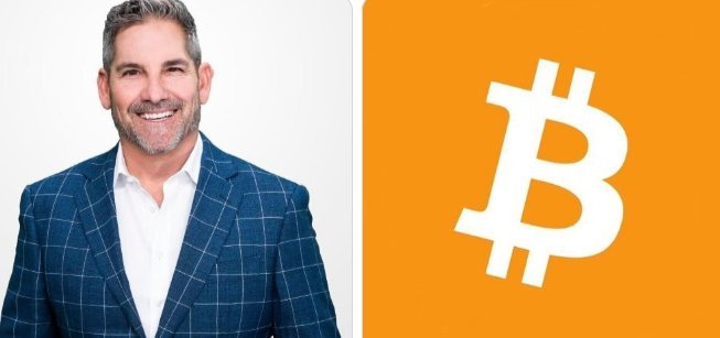 A man in a blue plaid blazer and white shirt smiles next to a large orange Bitcoin logo.