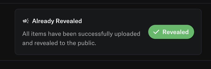 A notification banner stating 'Already Revealed - All items have been successfully uploaded and revealed to the public.' with a green 'Revealed' button.