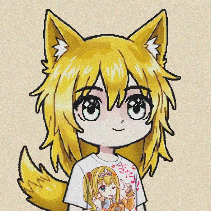 An anime-style illustration of a girl with blonde hair, fox ears, and a tail, wearing a white t-shirt featuring a smaller character and Japanese text reading "きましたよ!" (I've come!).