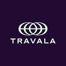 The image shows the Travala logo—a stylized design of three interlocking rings or circles—with the word "TRAVALA" in white text below it, set against a dark purple background. This branding relates directly to the news that Travala is expanding its platform to accept XRP for booking over 2.2 million hotels worldwide.