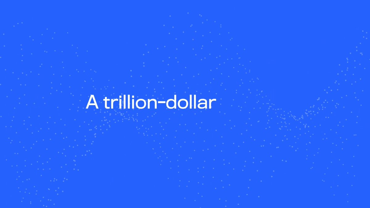 The image features a blue background with white text that reads "A TRILLION-Dollar" at the top, followed by a line of small white dots scattered across the frame. The text is positioned above a gray border, creating a contrast between the two colors. The overall layout and design suggest an advertisement or promotional material for a financial product or service.