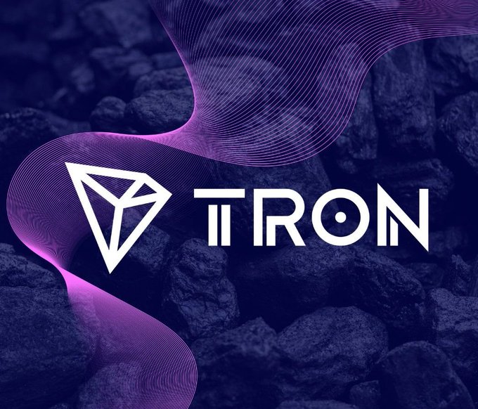 A promotional graphic for the TRON cryptocurrency featuring its diamond-shaped logo and 'TRON' text over a purple wave design on a rocky background.