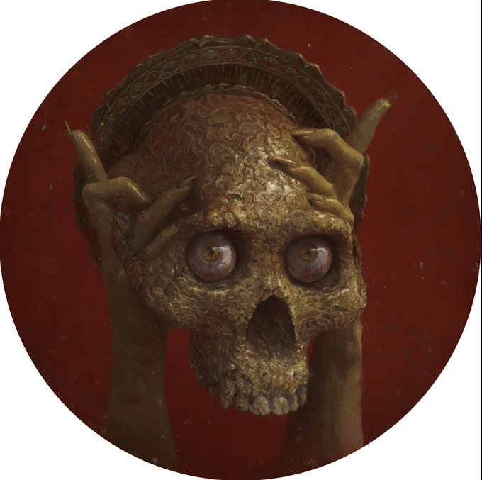 A dark fantasy illustration of a decaying golden skull with bulging eyes and bony hands gripping its temples, topped with an ornate jeweled crown against a deep red background.