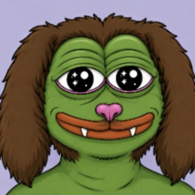 A digital illustration of a green creature with a wide, toothy grin, brown shaggy hair, and large, sparkly eyes.
