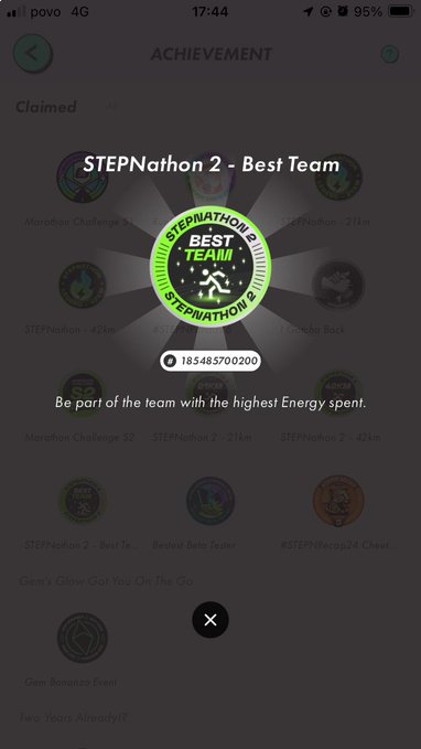 A mobile app screenshot displaying a 'STEPNathon 2 - Best Team' achievement badge for being part of the team with the highest energy spent.