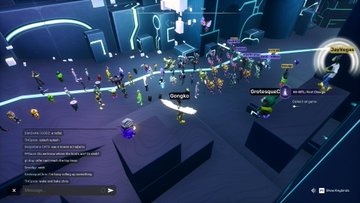A screenshot from a 3D multiplayer online game showing numerous colorful character avatars gathered in a neon-lit futuristic arena with chat messages visible on screen.