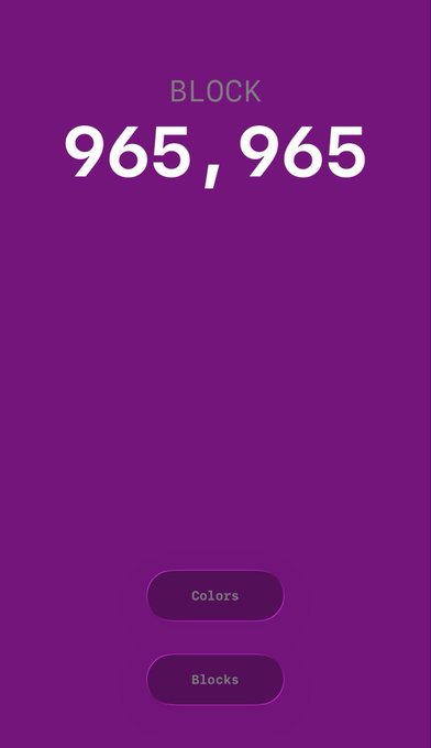 A purple screen showing a 'BLOCK' counter at '965, 965' with buttons for 'Colors' and 'Blocks' at the bottom.