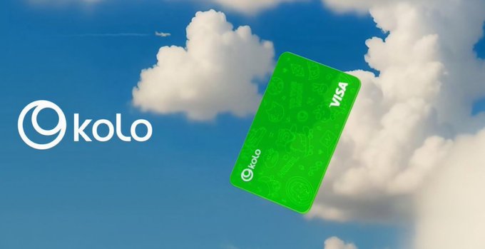 The image features a green Visa card floating in mid-air against a blue sky with white clouds, creating an interesting visual effect. The card appears to be floating above the clouds, suggesting that it might have been accidentally dropped or misplaced by someone. This scene could be related to the post about financial technologies and user adoption, where the focus is on how users interact with these systems rather than their technical aspects.