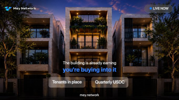 The image shows the Mey Network platform promoting a live real estate opportunity for a rental apartment building in Hanoi, with the tagline "The building is already earning, you're buying into it." The promotional graphic highlights key features—"Tenants in place" and "Quarterly USDC"—aligning with the post's message about purchasing fractional ownership of an income-generating property via app.meyreal.io.