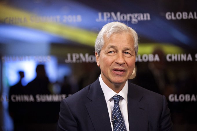 Jamie Dimon, CEO of JPMorgan, is shown at the J.P. Morgan Global China Summit 2018, speaking as he warns about the potential decline of the U.S. dollar's global reserve currency status.