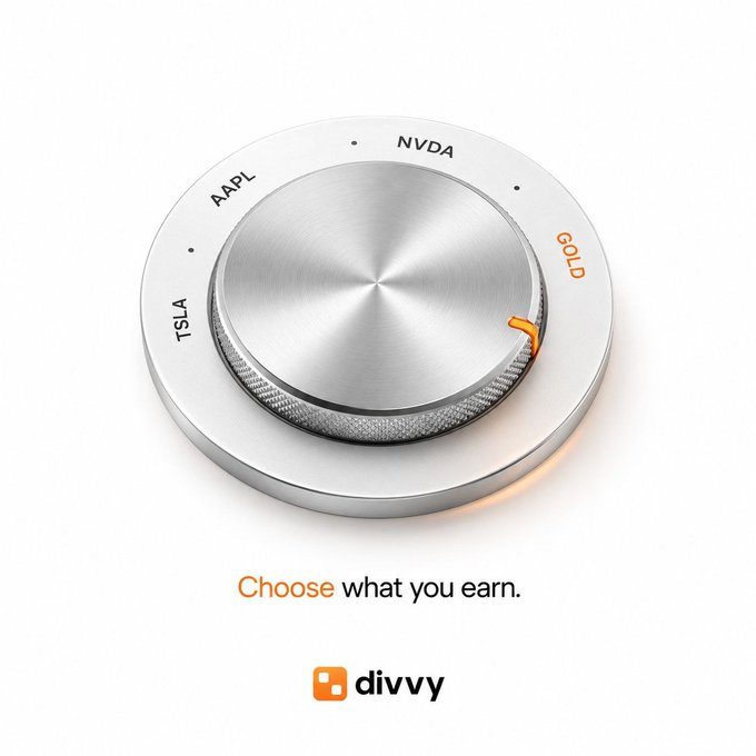 A sleek silver dial with asset options ($TSLA, $AAPL, $NVDA, $GOLD) sits above the "Choose what you earn." tagline and the "divvy" logo. The image visually reinforces the post's pitch for Divvy's tokenized stock rewards platform, highlighting user-selectable earning options like Tesla, Apple, and Nvidia alongside gold.