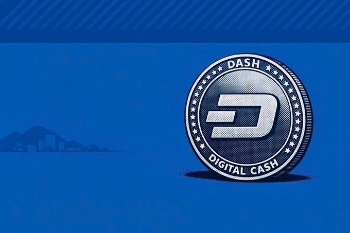 The image features a large, blue coin with the word "Dash" written on it. Below the coin, there's text that reads "Digital Cash", indicating that the coin might be related to digital currency or payment systems. The background of the image is a solid blue color, and in the top right corner, there are two small mountains visible.