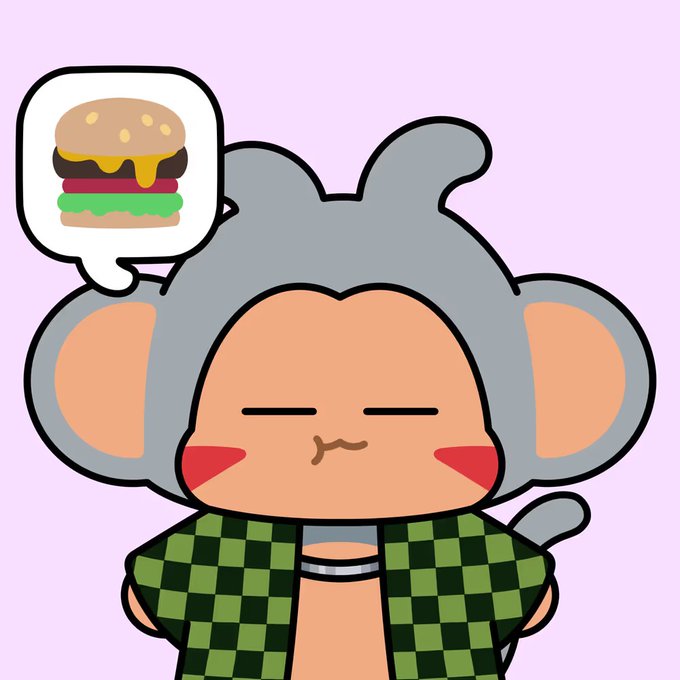 A cartoon monkey character with gray fur, a green checkered jacket, and red blushing cheeks has a thought bubble containing a cheeseburger above its head.