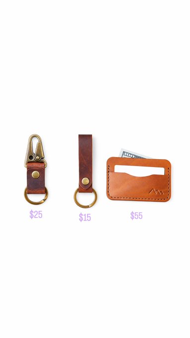 Three leather accessories displayed on a white background: a brown keychain with clip ($25), a leather strap with ring ($15), and a brown cardholder with cash ($55).