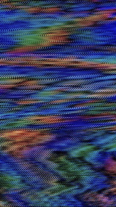 An abstract textured image with horizontal wavy lines in iridescent blue, purple, green, and orange hues resembling a holographic or digital pattern.