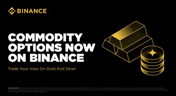 A Binance promotional graphic with the Binance logo and large yellow text reading "COMMODITY OPTIONS NOW ON BINANCE" alongside "Trade Your View On Gold And Silver," featuring illustrations of gold bars and a stack of coins with the Binance logo. The image visually promotes the post's announcement of Binance being the first to launch direct options trading on Gold and Silver for crypto-native traders.