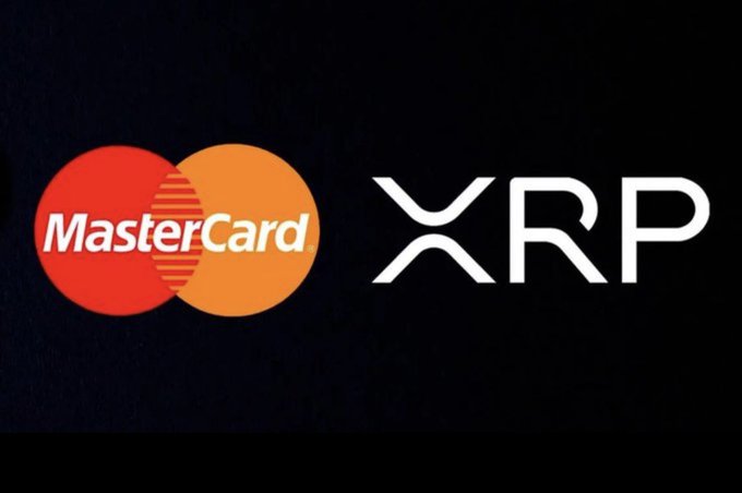 The MasterCard logo next to the XRP logo displayed on a black background, suggesting a partnership.
