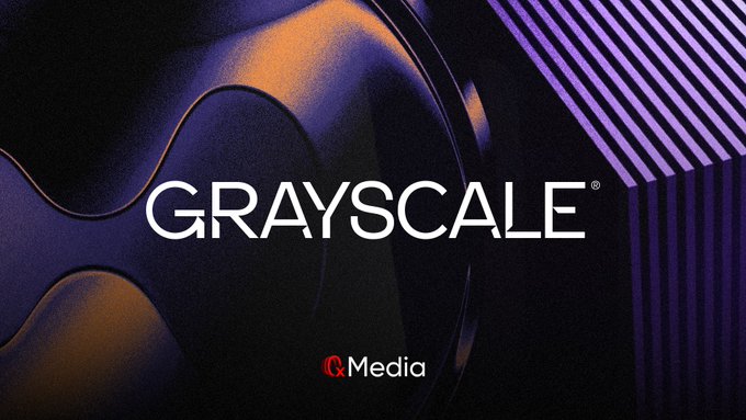 The image features a logo for Grayscale, which is an ETF related to media. The logo consists of two circles with different colors - one orange and one purple. The text "Grayscale" is written above these circles, indicating that this fund is associated with media. The background of the image is black, making the colors of the logo stand out more prominently.
