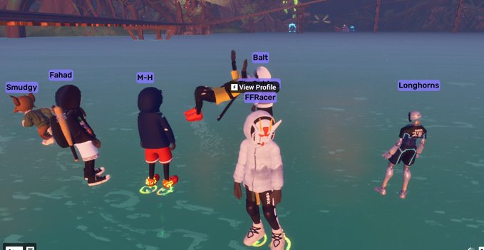 A group of animated avatars with name labels (Smudgy, Fahad, M-H, Balt, FFRacer, Longhorns) stand together in a virtual environment with a glowing floor.