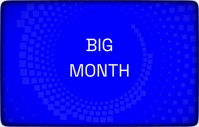 A blue graphic with a checkered background displaying the text 'BIG MONTH' in white.