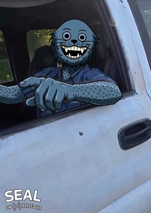 An illustrated blue furry creature with a wide grin leans out of a white vehicle window, with text at the bottom reading 'SEAL ON XRPLEDGER'.