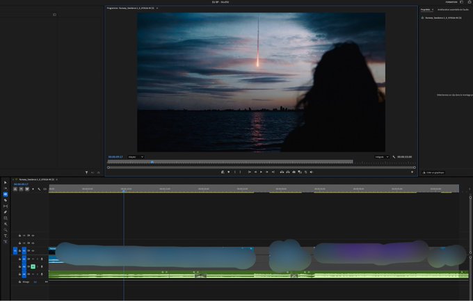 A screenshot of video editing software (Adobe Premiere) showing a video clip of a sunset/sunrise over water with a person's silhouette, along with audio waveforms on the timeline.