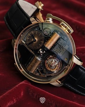 A luxury skeleton watch with a gold case and black leather strap rests on red velvet, revealing intricate mechanical gears and a tourbillon, with a 'TTG' watermark in the corner.