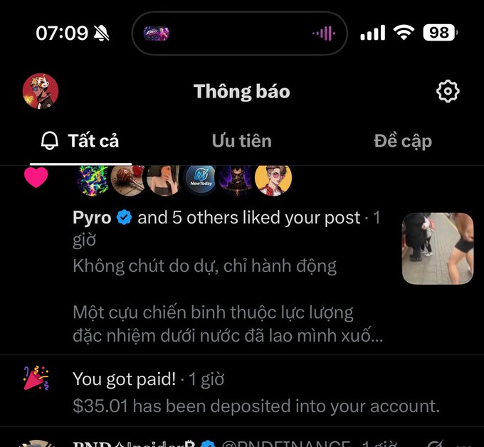 A smartphone screen displaying a Vietnamese social media notifications page, showing a like from 'Pyro' on a post, and a payment notification stating 'You got paid! $35.01 has been deposited into your account.'