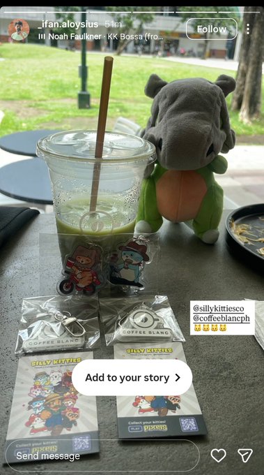 An Instagram story screenshot from @ifan.aloysius featuring a green iced drink, a plush toy, and Coffee Blanc merchandise with a KK Bossa (fro...) audio track.