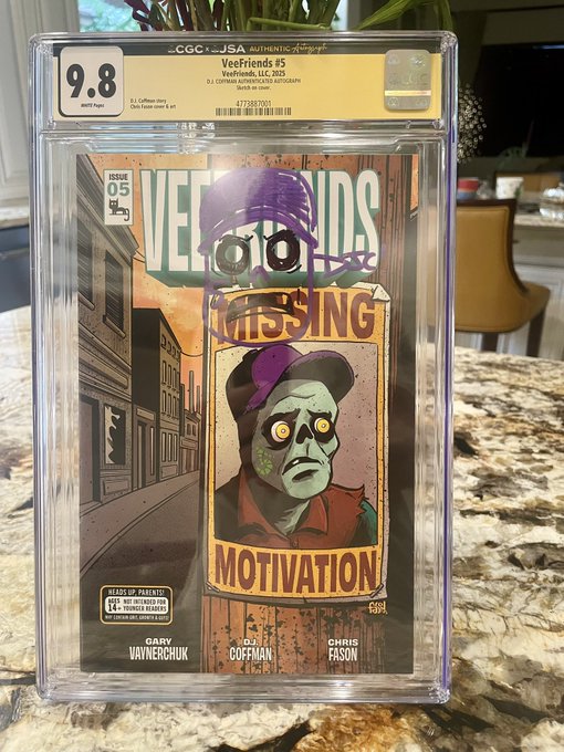 A CGC graded 9.8 comic book titled 'Veefriends #5' featuring colorful artwork and the word 'MISSING' is displayed on a granite countertop.
