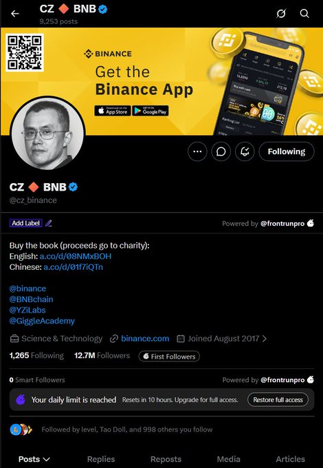 A Twitter/X profile page for 'CZ 🔶 BNB' (@cz_binance), the verified account of Changpeng Zhao with 12.7M followers, featuring a Binance app promotion banner and links to buy his book with proceeds going to charity.