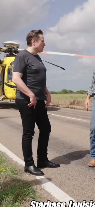 A man in a black t-shirt and pants stands on a tarmac in front of a yellow helicopter, with text at the bottom reading 'Starbase louisia'.