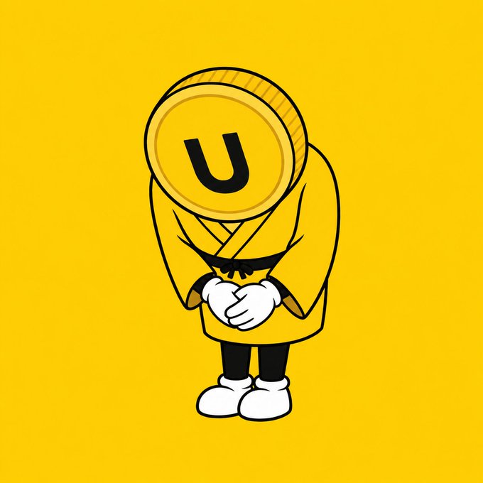 An illustration of a character in a yellow martial arts gi with a Unibright (U) coin for a head, standing with hands clasped against a yellow background.