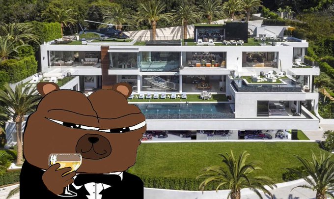 A cartoon brown bear in a black tuxedo sipping champagne, set against the backdrop of a luxurious modern white mansion with a pool and rooftop helicopter pad.