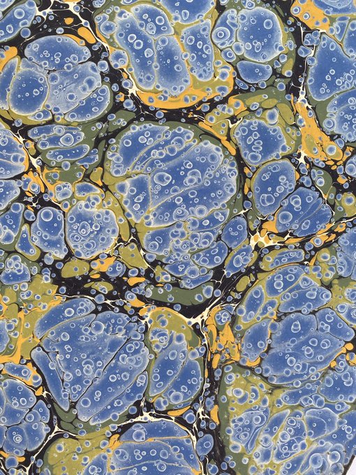 The image features a large, colorful abstract painting with blue and yellow circles scattered throughout the canvas. The artwork has a unique texture that resembles bubbles or marbled art, giving it an interesting visual effect. The painting is displayed prominently against a brown background, making it stand out even more. The caption below the image reads "Gn dear friends Sleep well Have a nice weekend! See you tomorrow!" This adds context to the artwork and suggests that it might be related to a social media post or event where people gather to appreciate art together.

The painting is also accompanied by an image of a person, likely a tagline for the artwork, which further emphasizes its connection to a specific audience or occasion.