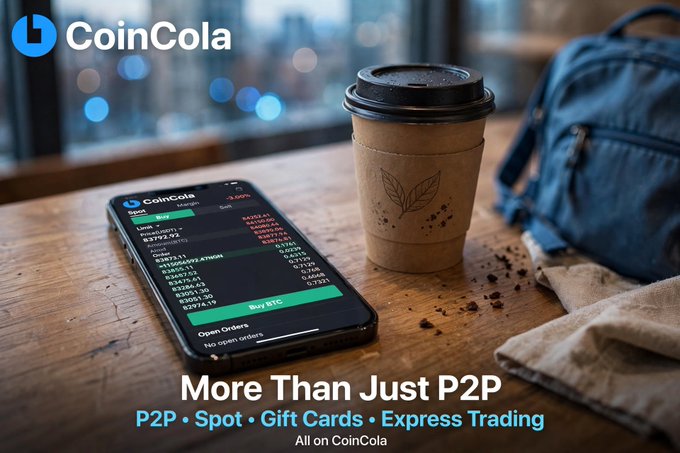 An advertisement for CoinCola cryptocurrency exchange showing a smartphone displaying the trading app next to a coffee cup, with text 'More Than Just P2P: P2P, Spot, Gift Cards, Express Trading'.