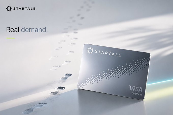 A promotional image for STARTALE featuring a metallic VISA Platinum card on a white surface with footprint trails and the tagline 'Real demand.'