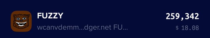 A crypto wallet screenshot displays the "FUZZY" token with a wallet address ending in "dger.net", showing a balance of 259,342 tokens valued at $18.08. The image supports the post by visually confirming the author is indeed a FUZZY token holder with a small holding, matching their message about being part of "the culture."