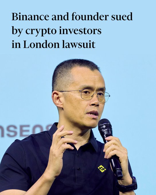 Changpeng Zhao, co-founder of Binance, is shown speaking into a microphone while wearing a black polo shirt with the Binance logo, accompanying a headline announcing that Binance and its founder are being sued by crypto investors in a London lawsuit.