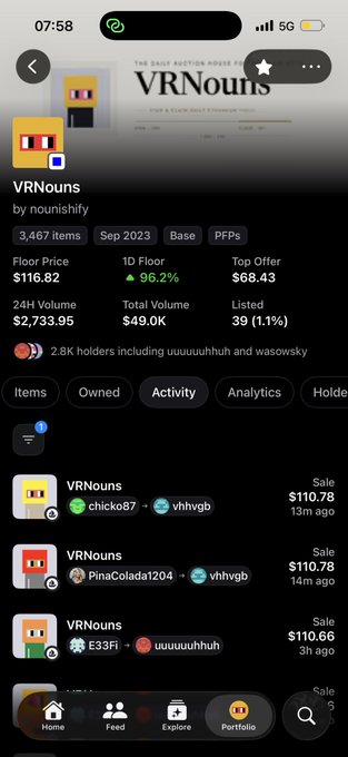 A mobile screenshot of a RaritySniper NFT collection page for "VRNouns" by nounishify, showing 3,467 items, a floor price of $116.82, 24H volume of $2,733.95, and recent sales ranging from $110.66-$110.78. The page supports the celebratory post about the project's growing market presence on the Base blockchain.