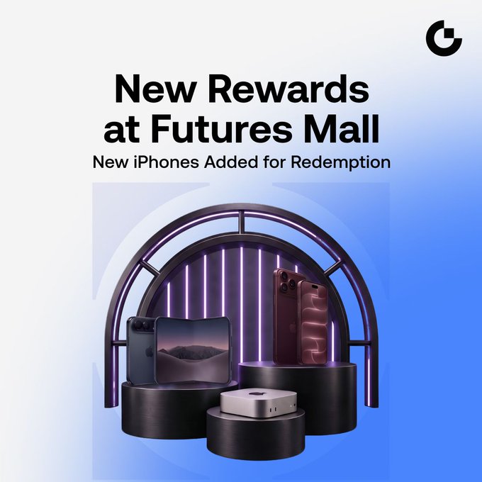 Gate.io's "New Rewards at Futures Mall" promotional graphic announces the addition of new iPhones for redemption, showcasing the latest iPhone models, an iPad, and a Mac Mini displayed on illuminated pedestals against a purple-lit backdrop—aligning with the post about Apple devices now available in Gate Futures Mall as part of the AI Gear Upgrade Season.