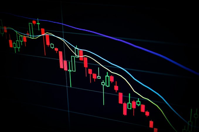 The image displays an interactive infographic with a downward sloping graph against a dark background displaying a series of red bars with labels like "edgeX", "edge X", "EDGE token plunged about 71% in a June 2 flash crash" among others. The text above and below the chart suggests that it is offering a cash reward for anyone who can identify what this image represents, which appears to be a visual representation of an investment platform or cryptocurrency crash. This information may help users understand more about current market conditions better than just looking at the graph itself.