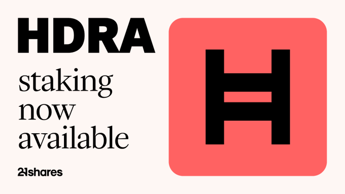 A promotional graphic announces that staking is now available for the 21shares Hedera Staking ETP ($HDRA), featuring the bold "HDRA staking now available" text alongside the product's coral-colored app icon with a stylized black "H." The image visually reinforces the product update by highlighting both the ticker symbol and the staking feature newly enabled for investors.