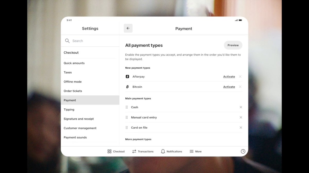 The screenshot displays Square's payment settings interface on a tablet, showing the "All payment types" menu where merchants can enable Afterpay and Bitcoin as new payment options alongside main types like Cash, Manual card entry, and Card on file. The image relates to Square's announcement by illustrating the platform's expanded payment capabilities, including the addition of cryptocurrency (Bitcoin) and buy-now-pay-later (Afterpay) services for merchants.